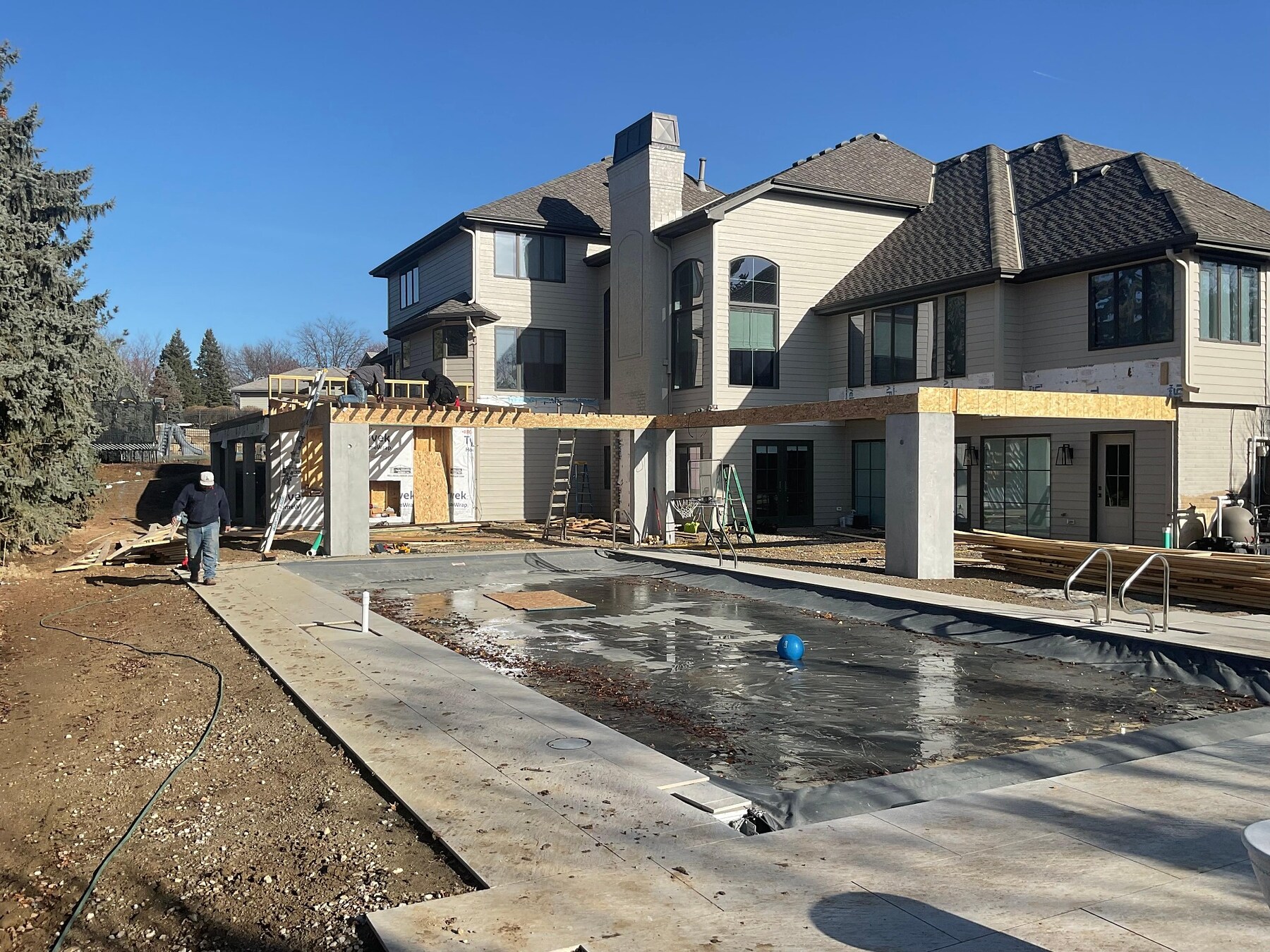Deck framing under construction on a luxury residence by AEC Construction