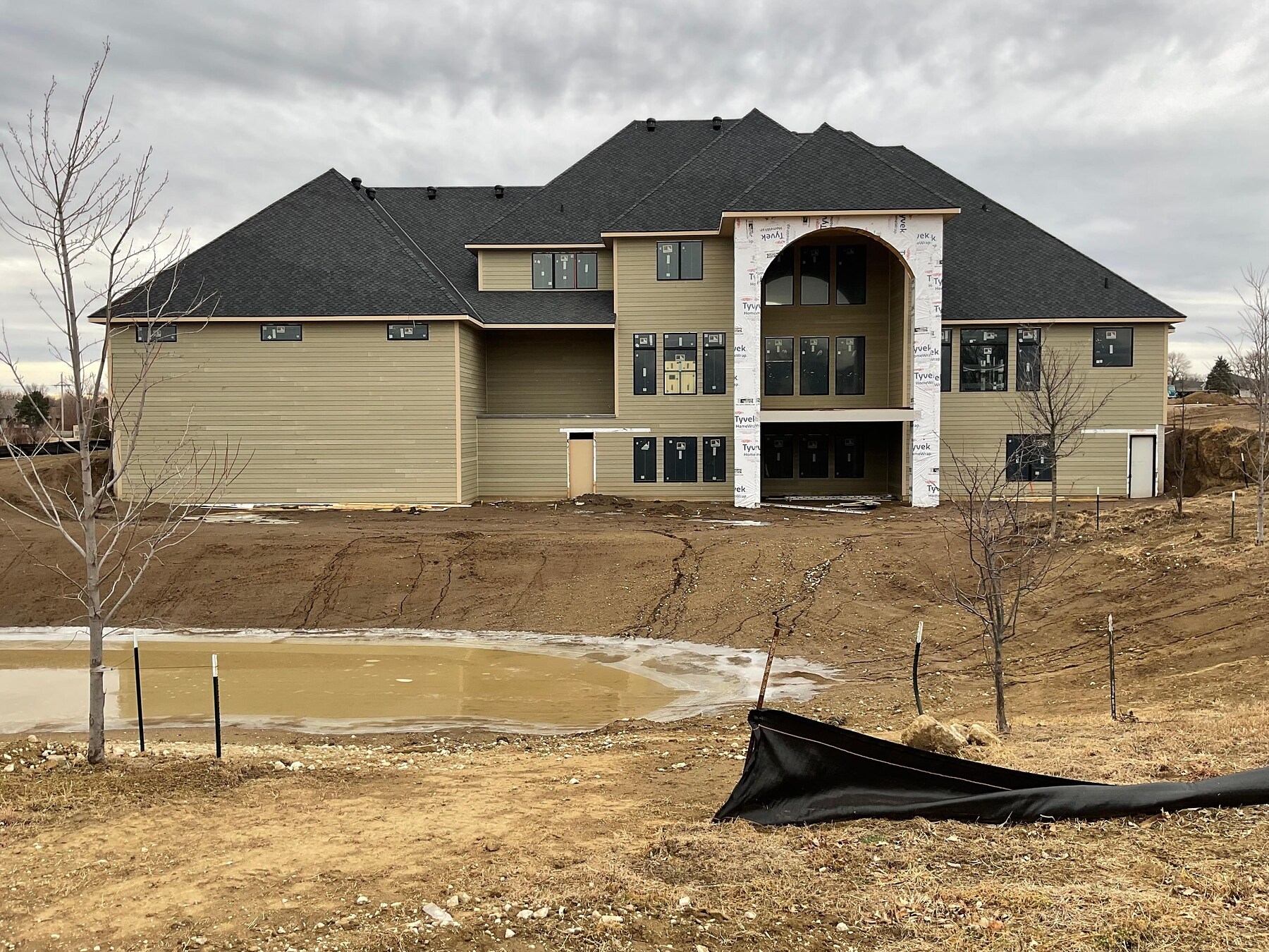 Luxury home siding installation by AEC Construction